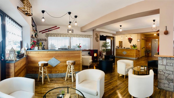 Foto del bar B&B-Hotel + Residence Piccolo Chalet