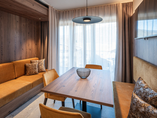 La zona giorno Corones Suites - Dolomites Residence