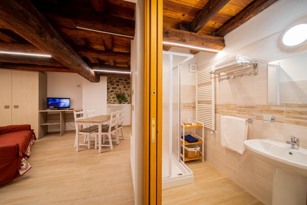 Foto del bagno Camere + Appartamenti Maison de Rosy