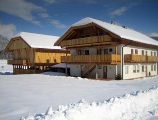 Foto invernale di presentazione Appartamenti in agriturismo Liebharterhof
