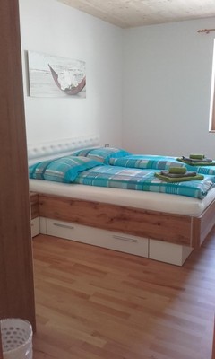 Foto vom Zimmer Ferienwohnungen Weingenuss