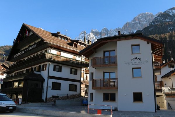 Photo exteriors in summer Europa Mountain Apartments
