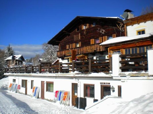 Winter Präsentationsbild Berghütte mit Zimmern Graziani Lodge