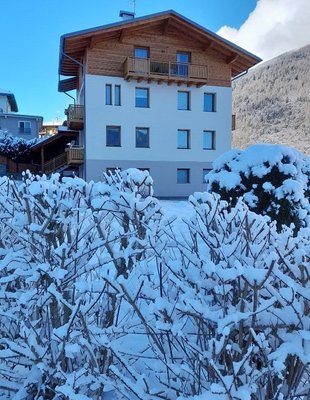 Foto invernale di presentazione Appartamenti Penasa Renato