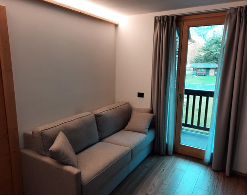 La zona giorno Appartamenti Olympic Chalet