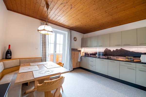 Foto der Küche Apartments Stua da Carlo