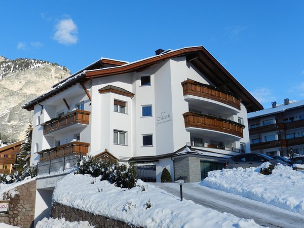 Foto invernale di presentazione Garni-Hotel + Residence Mezdì
