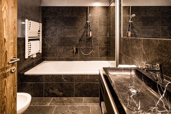 Foto del bagno Hotel Touring Dolomites