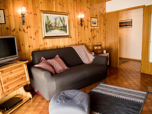 La zona giorno Appartamento La Finestra sulle Dolomiti