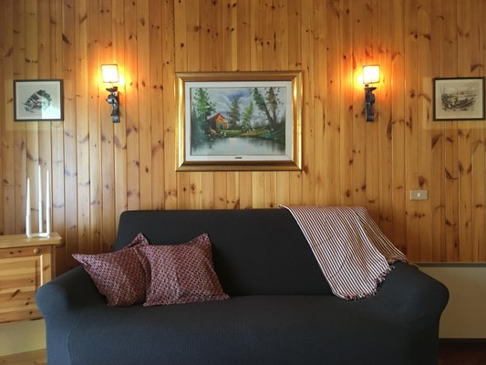 La zona giorno Appartamento La Finestra sulle Dolomiti