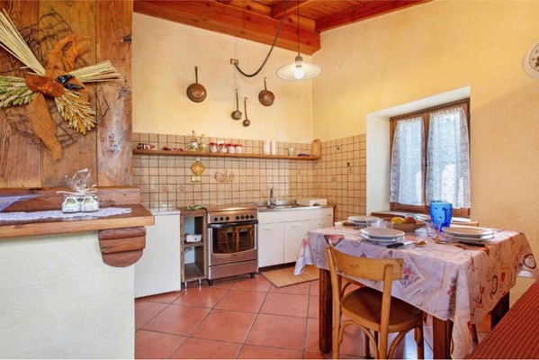 Photo of the kitchen Alloggio La Tour