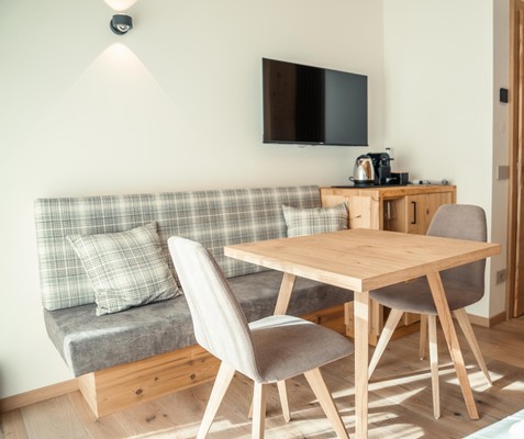 La zona giorno Vivi Suites&Spa - Boutique Guest House Molveno
