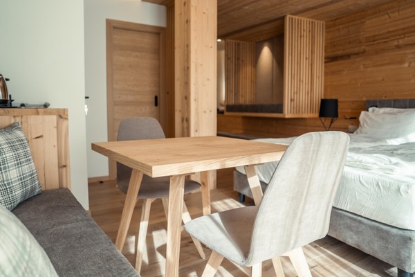 La zona giorno Vivi Suites&Spa - Boutique Guest House Molveno