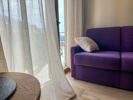 La zona giorno Vivi Suites&Spa - Boutique Guest House Molveno
