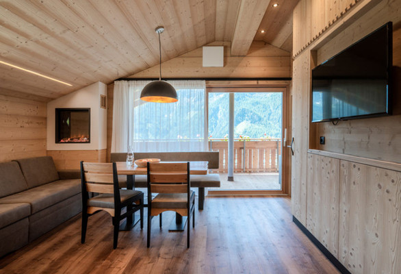 La zona giorno Appartamenti in agriturismo Alm Chalets Hochgruberhof