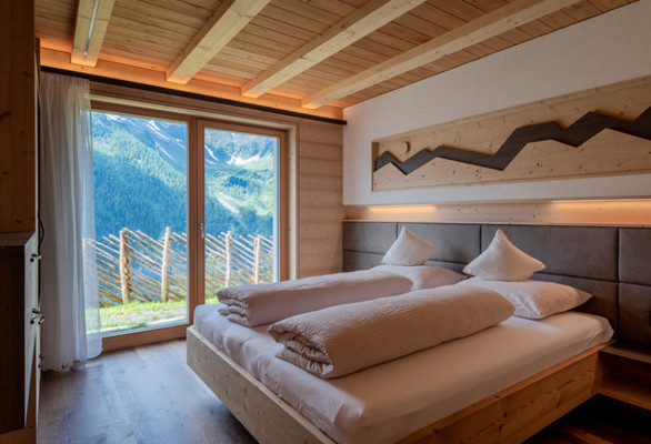Foto della camera Appartamenti in agriturismo Alm Chalets Hochgruberhof