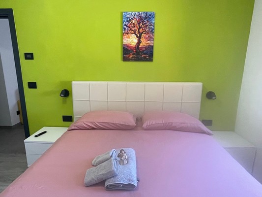 Foto della camera Appartamento Pineta casa vacanze Sci & Natura