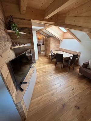 Der Wohnraum Ferienwohnung Wood Lodge - Pragma Apartments