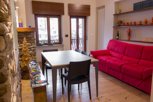 Der Wohnraum Ferienwohnung sulla piazzetta centrale