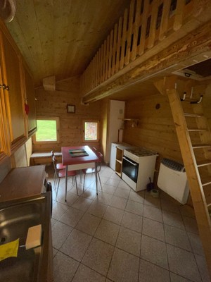 La zona giorno Appartamento Baita Borgo La Fitta