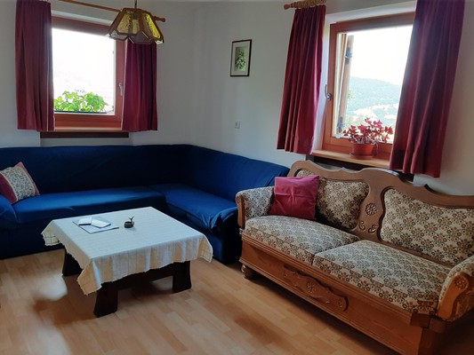 Das Wohnzimmer Ferienwohnungen auf dem Bauernhof Paulrainer