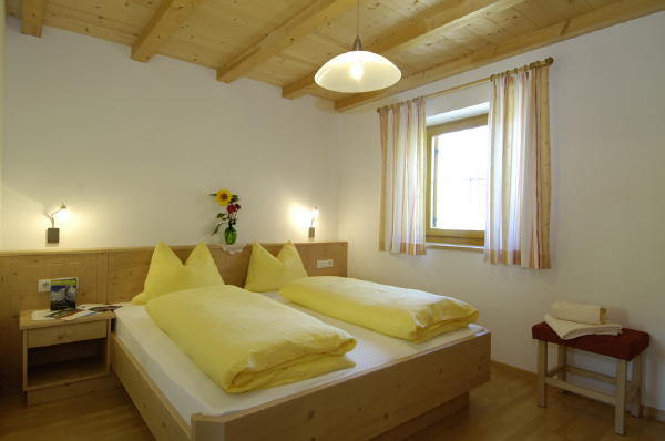 Foto della camera Appartamenti in agriturismo Aichbühlerhof