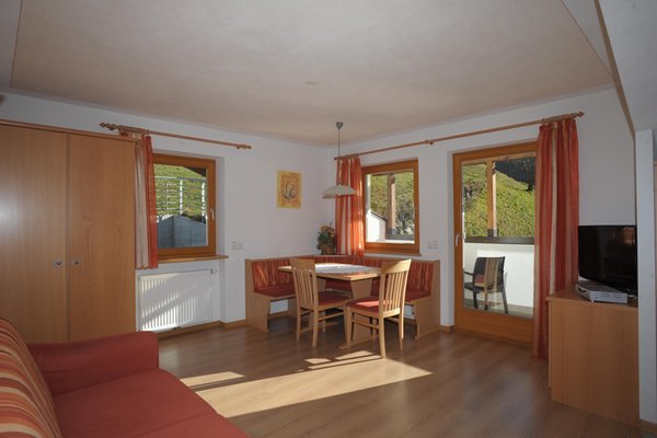 The living area Großarzbachhof - Rooms + Apartments in farmhouse 3 flowers