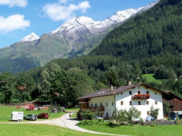 Foto estiva di presentazione Obergruberhof - Appartamenti in agriturismo 3 fiori