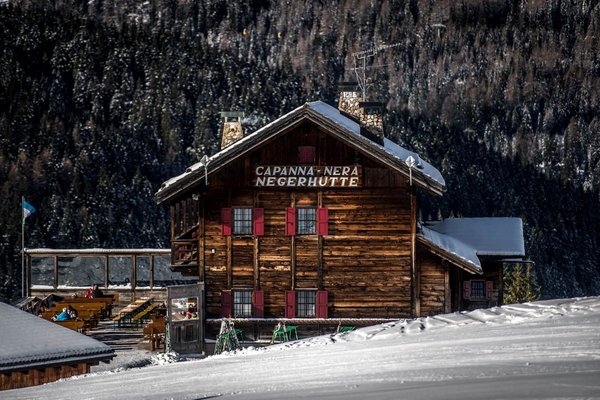 Winter presentation photo Mountain hut Capanna Nera