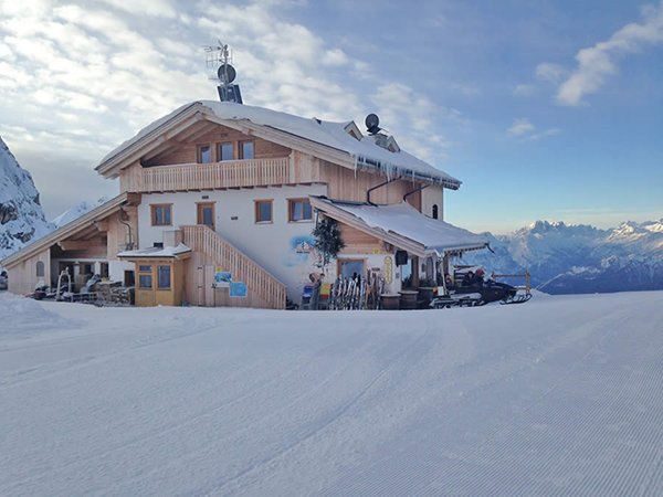 Winter presentation photo Mountain hut with rooms Averau