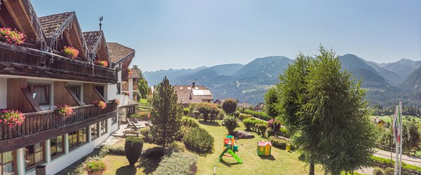 Photo exteriors in summer Bellacosta Parkhotel