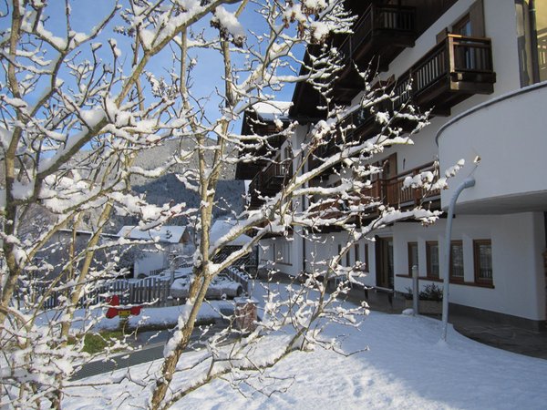 Photo exteriors in winter FORESTO - holiday apartments