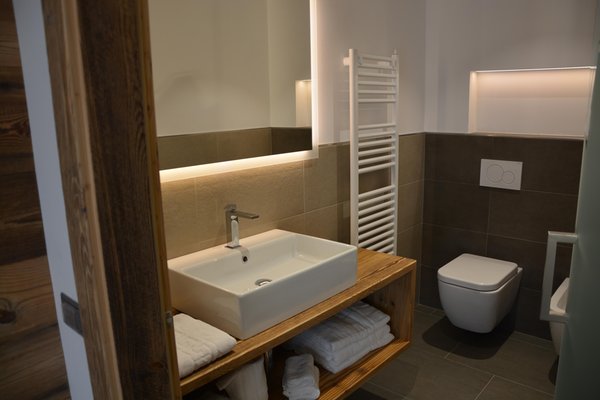 Foto del bagno DOLOMITES B&B - Suites, Apartments and SPA