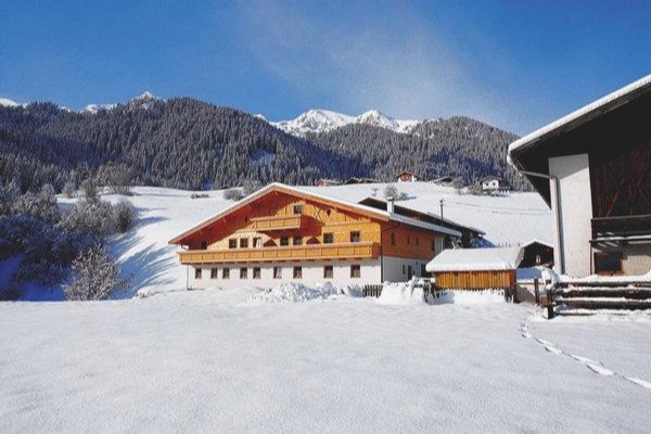 Foto invernale di presentazione Thalhof - Appartamenti in agriturismo 3 fiori