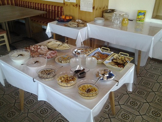 La colazione Pensione + Appartamenti in agriturismo Langwieserhof