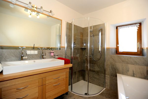 Foto del bagno Appartamenti in agriturismo Gostner-Hof