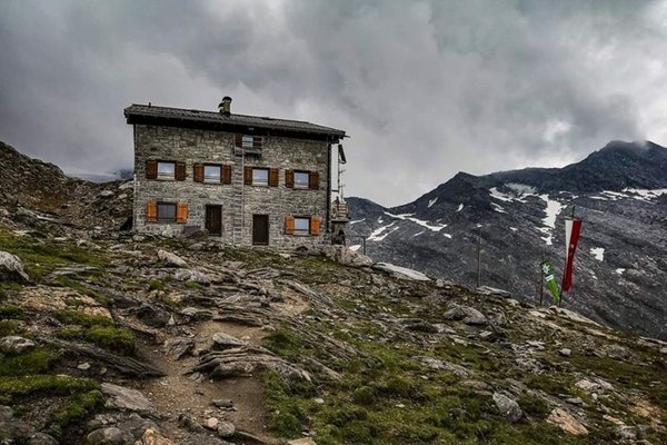 Photo exteriors in summer Mountain hut Hochfeilerhütte