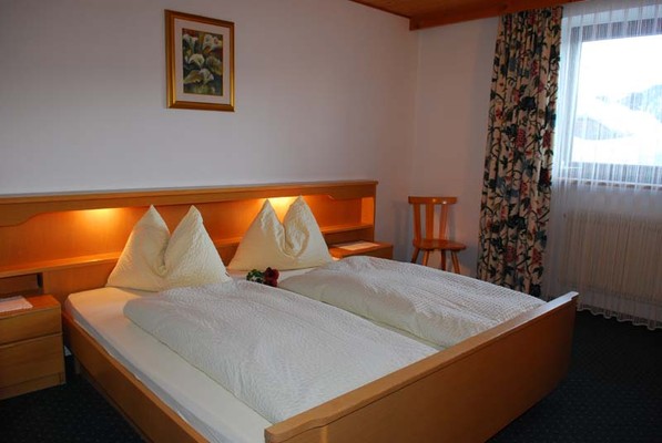 Foto della camera Garni (B&B) + Appartamenti Sunnseit'n