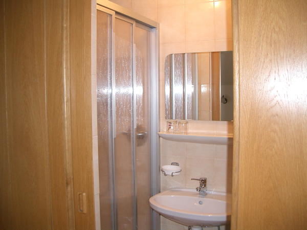 Foto del bagno B&B + Appartamenti La Ütia