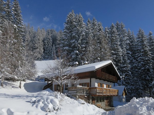 Foto invernale di presentazione Baumannhof - Appartamenti in agriturismo 3 fiori
