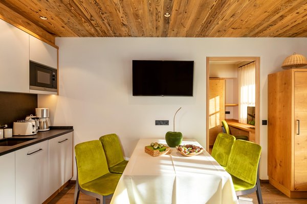 La zona giorno Appartamenti La Villetta & Chalets 4 Sorus