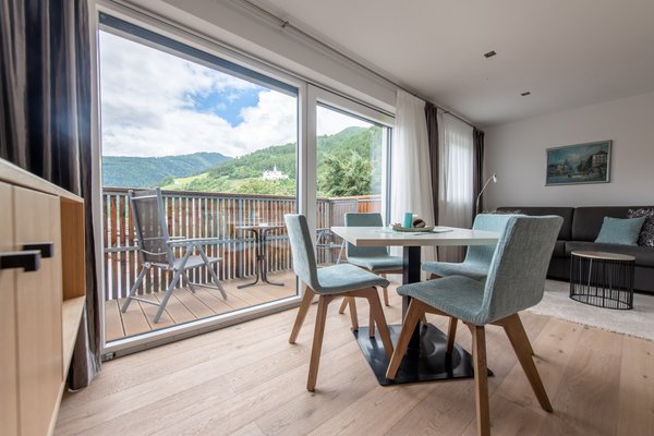 La zona giorno Lapis Monti - Apartments & Suites