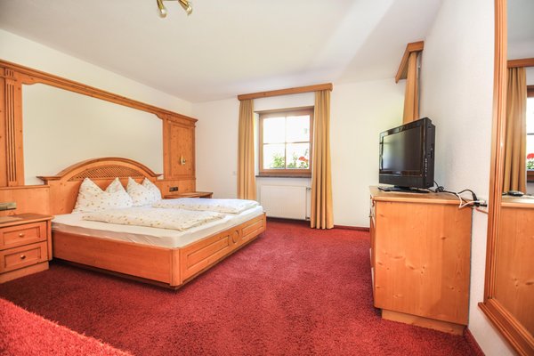 Foto vom Zimmer Garni-Hotel + Ferienwohnungen Des Alpes
