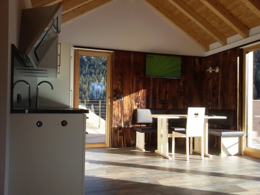 La zona giorno Appartamenti in agriturismo Haus Larix