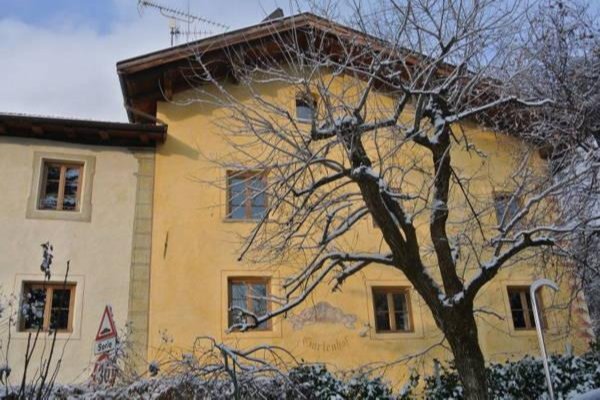 Foto invernale di presentazione Appartamenti in agriturismo Tenuta Gurtenhof