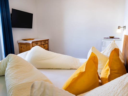 Foto vom Zimmer Pension + Ferienwohnungen Chalet Andy