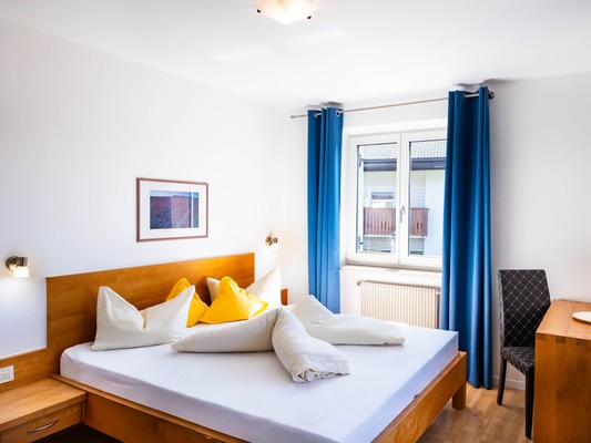 Foto vom Zimmer Pension + Ferienwohnungen Chalet Andy