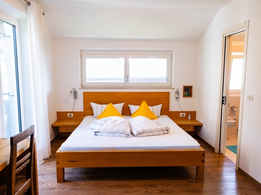 Foto vom Zimmer Pension + Ferienwohnungen Chalet Andy