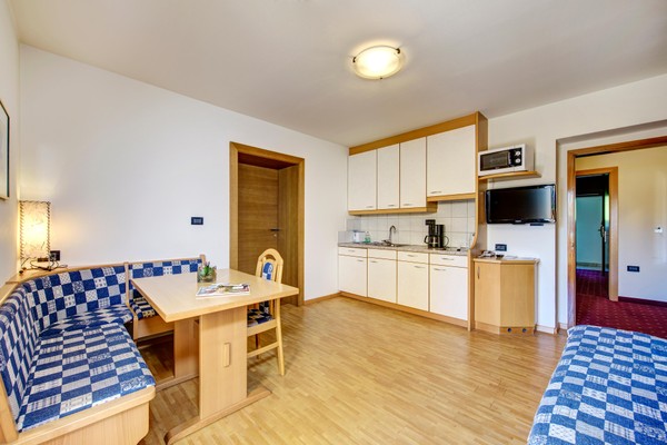 The living area Hotel + Residence Ruster Resort