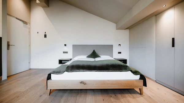 Foto vom Zimmer Garni-Hotel + Residence Stricker